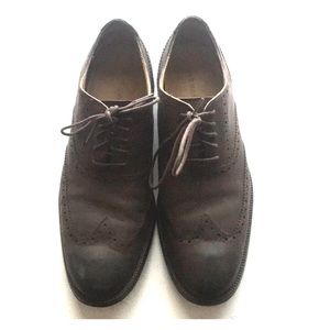 Brown leather Cole Haan men’s size 11 wingtips.